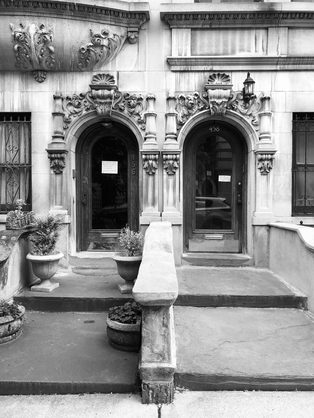 A photo of Harlem Townhouses, 142nd Street, 5/24/2020 in black and white