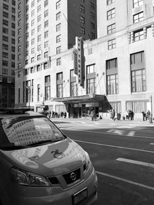 A photo of New Yorker Hotel, 8th Avenue, 3/1/2020 in black and white